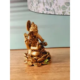 Aakrati Yellow Lord Ganesha Idol Brass Showpiece-image-5