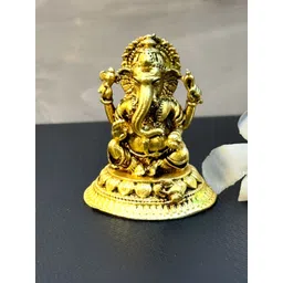 Aakrati Yellow Lord Ganesha Idol Brass Showpiece-image-3