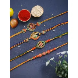 eCraftIndia Set of 4 Om, Swastika, Peacock, Pearls, Rakhis with Sibling Agreement & Roli Chawal Pack-picture-20