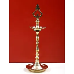 Exotic India Gold Toned Brass Five Wick Lamp-image-48