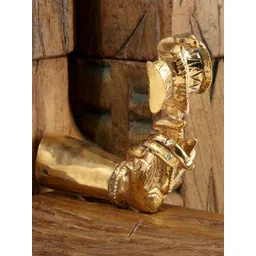 Exotic India Gold Toned Brass Goddess Hand Holding Damaru-picture-37