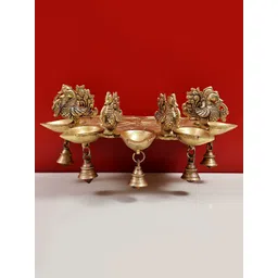 Exotic India Gold-Toned Brass Wall Mount Bracket Peacock Diya with Bells-image-9