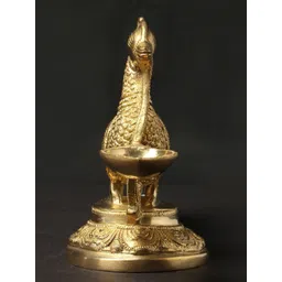 Exotic India Gold Toned Textured Peacock Brass Oil Lamp-image-22