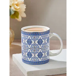 Fabindia Gulmohar Decaled Blue & White Printed Ceramic Glossy Mug 270ml-image-9