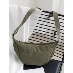 GLOSSY Half Moon Sling Bag with Tasselled-picture-17