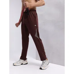 HRX by Hrithik Roshan Men Graphic Printed Rapid-Dry Mid-Rise Training Track Pants-picture-39