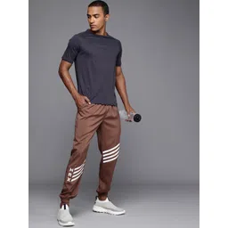 HRX by Hrithik Roshan Men Solid Rapid-Dry Antimicrobial Training Joggers Track Pants-image-36