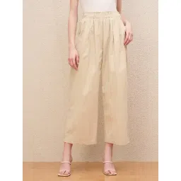 Iconic Beige Solid Paperbag Waistband Baggy Pants-picture-24