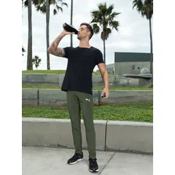 one8 x PUMA Men Solid Mid Rise Knitted Slim Fit Track Pants-image-0