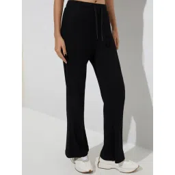studiofit women Studiofit by Westside Black Textured High-Rise Flared Track Pants-picture-33