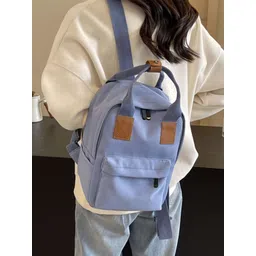 StyleCast x Revolte Unisex Backpack image 2