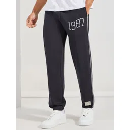 Styli Men Black Relaxed Fit Terry Joggers with Side cord and Embroidery Detail-picture-22