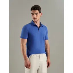TOMMY HILFIGER Blue Solid Slim Fit Cotton Polo T-Shirt image 4