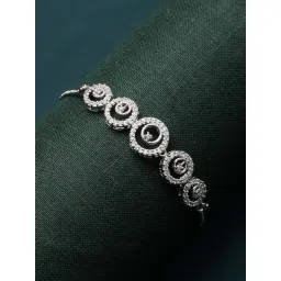 Zeneme Rhodium Plated Silver Toned American Diamond Crystal Oval Bracelet-picture-29